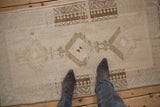 A personal perspective on the soft, even wear of a vintage distressed Turkish Malatya rug.