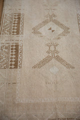 Geometric pawn design motifs and hook and latch designs on a low, even pile.