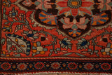 Detailed floral border and time-softened pile of a collector Farahan Sarouk rug.