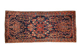 Transitional antique Farahan Sarouk runner, navy field, floral medallion, serpent border, 2'2