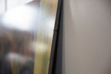 Side profile view of the Harry Potter poster's thick, black foam board construction.