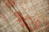 Mostly even wear on a vintage Oushak showing low-worn knots and visible foundation.
