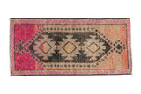 Vintage distressed Kars rug with triple geometric medallions in charcoal, magenta, and dusty melon.