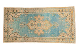 Vintage distressed Oushak runner with abrash sky blue field and cream trefoil medallion. 2'5