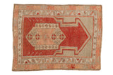 Vintage distressed Oushak prayer rug with a geometric motif in cherry red and greige.