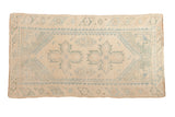Distressed vintage Turkish Dosemealti rug with ivory field, pale blue geometric medallions, 2x4 ft.