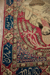 Finely knotted detail of seated royalty and navy blue inscription border on a pictorial Kerman rug.