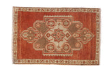 Vintage distressed Oushak rug mat, abrashed rust ground, coffee brown, ivory geometric medallion, 1'6