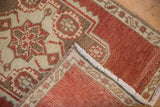 Distressed pile, reverse foundation, and fringe of this hand knotted Turkish Oushak rug.