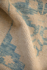 Detailed view of the Turkish Oushak weave, highlighting the even wear across the knot heads.