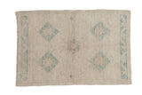 Distressed Oushak rug featuring soft ivory and powder blue diamond medallions, 2'3