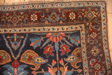 The burgundy main border of an antique Kurdish Bijar with boteh and Samovar design motifs.