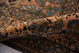 Dense, like-new wool pile of an antique Persian rug highlights sandalwood and navy blue palmettes.
