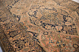 Detailed angled view of the full, dense pile of a fine antique Mohtashem Kashan collector rug.