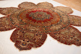 A collector's antique silk Tabriz rug with a rare trefoil silhouette, inscribed border, and red medallion.