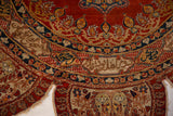 Detail of inscriptions and serrated motifs on the frayed border of a fine silk Tabriz rug.