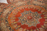 Collector's antique silk Tabriz rug showing the intricate roundel design and calligraphic main border.