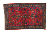 Vintage Lilihan rug with a raspberry red field covered in intricate blue and gold floral sprays.