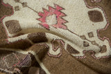 Close view of the distressed Kars rug's pile showing even wear to the hand-knotted texture.