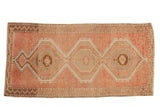 Vintage Distressed Kars runner: geometric medallions on a blush field, even wear visible, 2'9