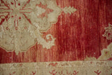 Heavily abrashed pomegranate red field and low pile texture of a distressed Anatolian rug.