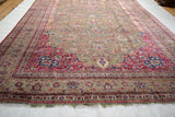 Antique Silk Souf Kashan: rare jade green field, finely delineated floral tendrils, deep red border, wispy fringe.