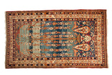 Rare Qajar period Kermanshah carpet with a masterfully woven Tree of Life composition.