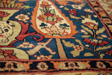 Surrealist devil figure motif within a floral vase on a fine 19th-century Persian Kermanshah carpet.