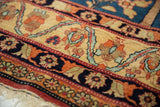 Fine kork wool pile and detailed floral guard borders of a collector's antique Kermanshah carpet.