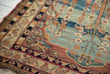 Intact original side cord and detailed floral borders on a fine antique Kermanshah carpet.