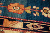 Silky Kork wool pile and fine asymmetrical knots of an antique Kermanshah floral motif.