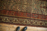Tree of Life field and pomegranate floral border of a late 19th-century Persian Fereghan carpet.