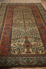 Detailed perspective of the antique Fereghan's Tree of Life field and its floral borders.
