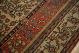 Intricate floral motifs and pomegranate minor border on a fine antique Fereghan carpet.