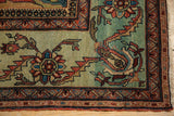 Close-up on the reconciled corner of an antique Fereghan showing its fine, low pile.