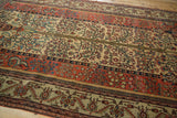 Bands of Tree of Life and floral motifs on a late 19th-century hand-knotted Fereghan carpet.