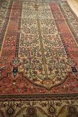 Longitudinal view of the antique Fereghan's Tree of Life field and surrounding floral borders.
