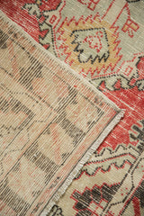 Hand-knotted construction and weave on the reverse of a vintage Oushak rug runner.