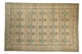 Distressed vintage Kayseri rug with a repeating panel design in slate blue, sand, and antique ivory.