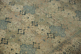 Low-cut, even wear on a vintage Kayseri carpet showing floral motifs in repeating panels.