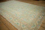 Angled perspective of a vintage Sparta carpet showing its low-pile texture and geometric field.