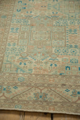Low-angle view of the vintage Sparta carpet's geometric motifs and evenly worn low pile.