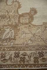 Detail of the distressed vintage carpet's low pile showing even wear to the knot heads.
