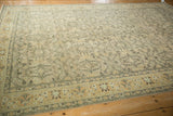 Distressed vintage Sivas with palmette border and allover diamond vine motifs.