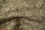 A folded view of the distressed Sparta carpet highlights its low, even wear and texture.
