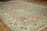 Low angle view across the distressed Kayseri carpet highlighting its evenly worn pile and soft colors.