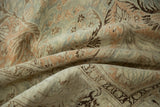Softly worn, low pile of a vintage Kayseri carpet showing detailed floral patterns.
