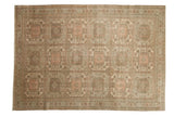 Vintage distressed Sparta carpet with columns of geometric floral guls in dusty rose, pale green, and ivory.