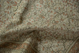 Low pile and worn texture of a distressed Kayseri with sandalwood floral motifs.