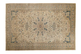 Vintage distressed Kayseri carpet with a starburst medallion and navy blue details on an antique ivory field.